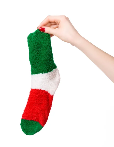Frau hält Socke in der Hand — Stockfoto