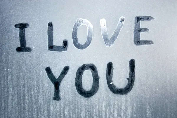 Miluji tě text na zamrzlé sklo — Stock fotografie
