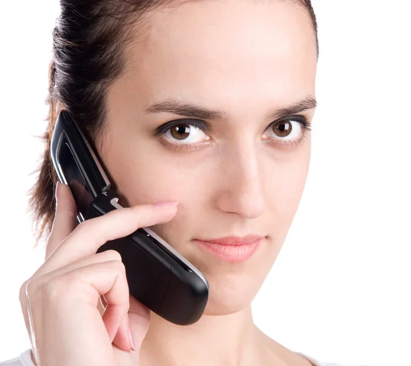Молодая женщина говорит по телефону — стоковое фото