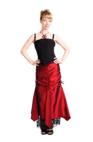 Ung kvinna i långa röda klänning — Stockfoto