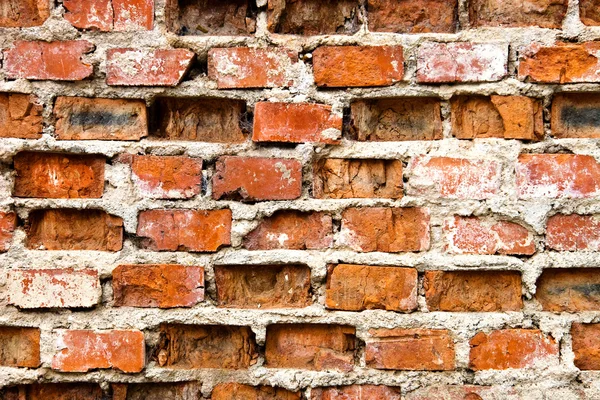 Çok eski ve hasarlı tuğla duvar — Stok fotoğraf