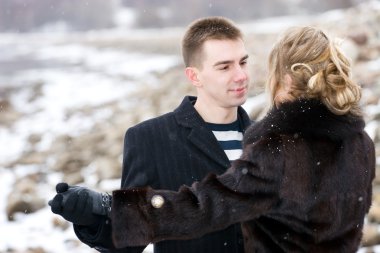 Couple in love dancing outdoors clipart