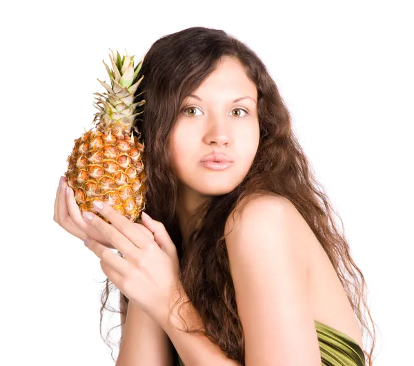 Młoda kobieta z ananasem — Zdjęcie stockowe