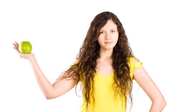 Młoda kobieta trzyma jabłko — Zdjęcie stockowe