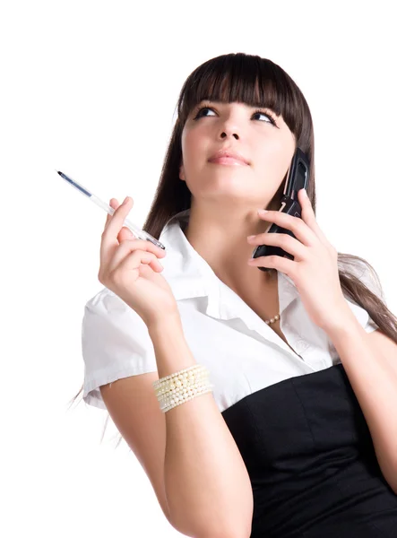 Businesswoman with pen and mobile phone — Stock Photo, Image