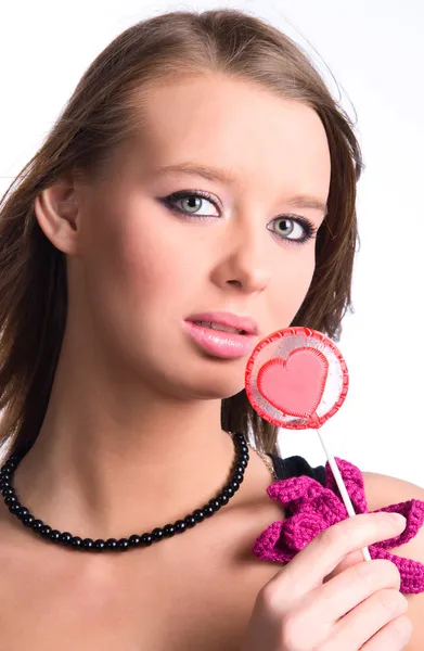 Young woman portrait with lollipop — Stock Photo, Image