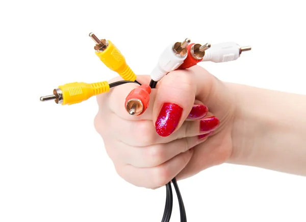 Vrouw hand met tv kabel pinnen — Stockfoto