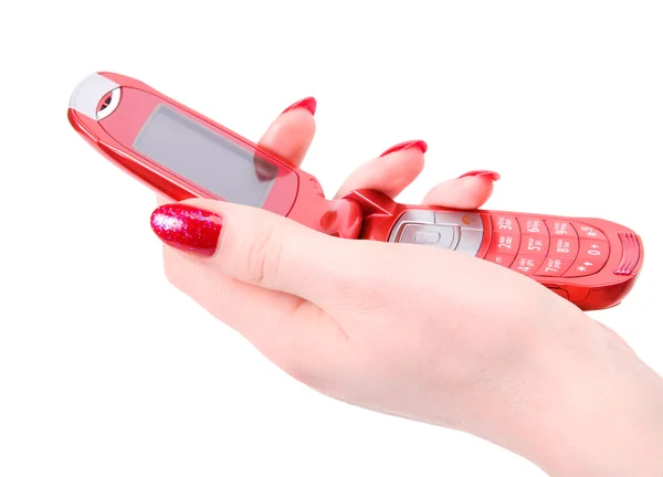Kvinna hand med röd mobiltelefon — Stockfoto