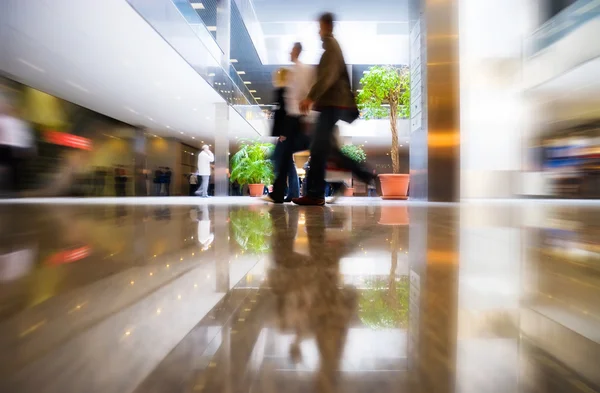 Walking in modern business center — Stock Photo, Image