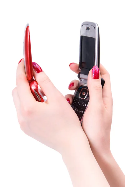 Dos manos de mujer con teléfono móvil — Foto de Stock
