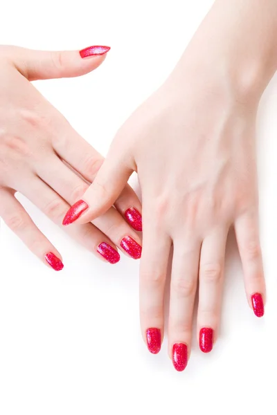 Hermosas manos de mujer con uñas rojas — Foto de Stock