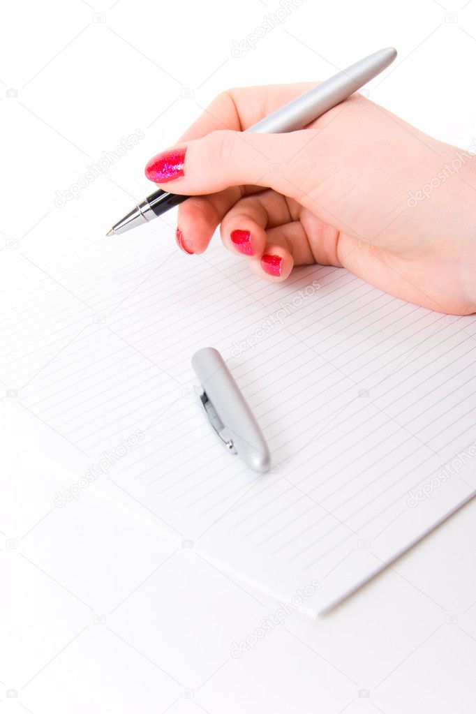 Woman hand with pen and paper