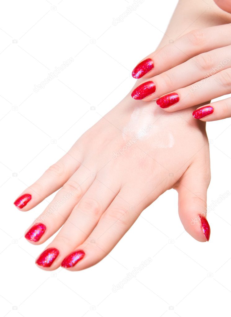 Two woman hands with body cream