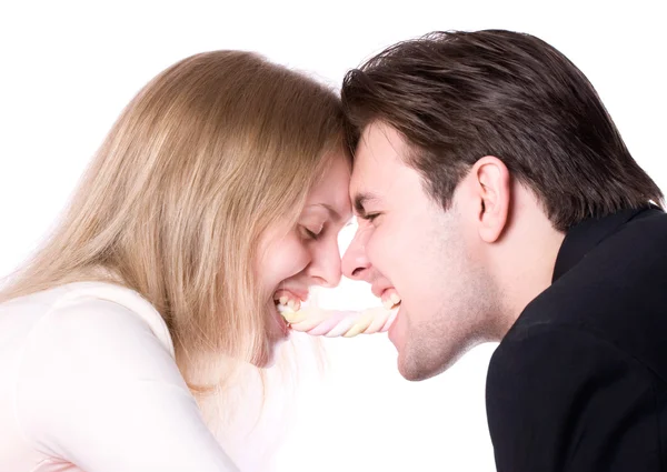 Homem e mulher lutando por um doce — Fotografia de Stock