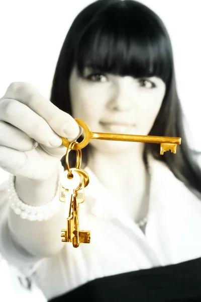 Wyciąganie klawiszy złota kobieta — Zdjęcie stockowe