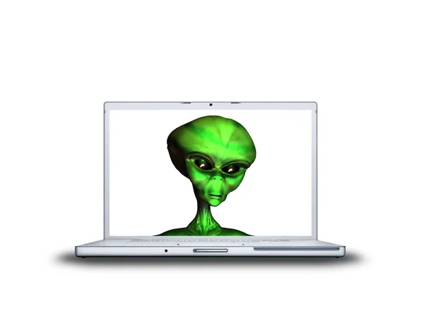 Cabeza alienígena en la pantalla del portátil —  Fotos de Stock