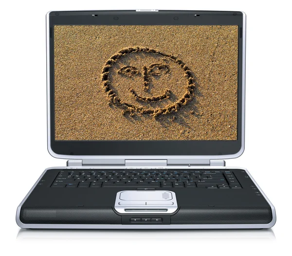 Glimlach op laptop scherm — Stockfoto