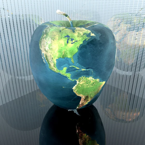 Яскраве яблуко з текстурою землі — стокове фото