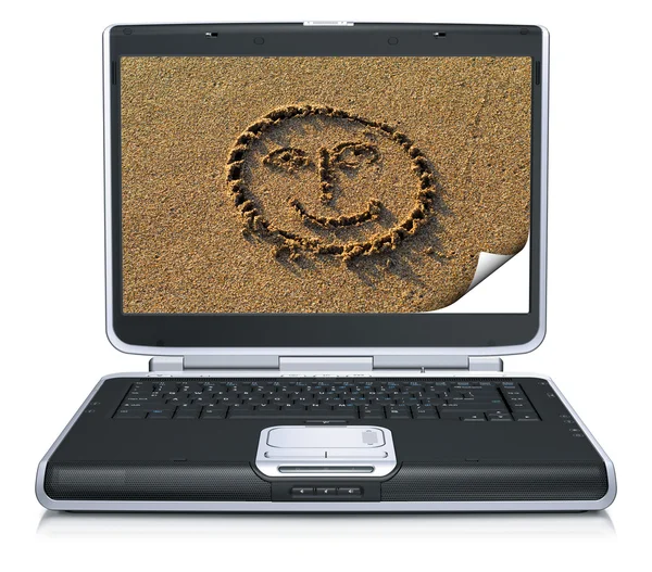 Glimlach op laptop scherm — Stockfoto