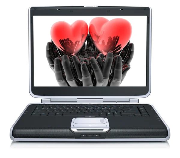 在笔记本电脑屏幕上的情人节红色心 — 图库照片