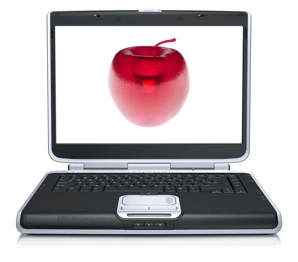 Стекло яблоко на экране ноутбука — стоковое фото