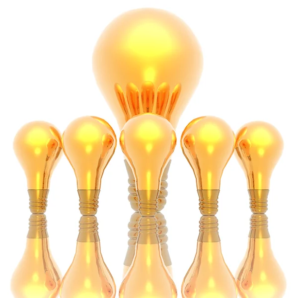 Gouden lightbulbs geïsoleerd op een witte — Stockfoto