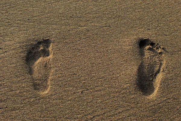 Footprints on the Sea beach sand — Stock Photo, Image