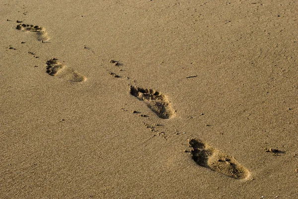 stock image Footprints on the Sea beach sand