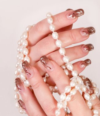 Playing with pearls clipart