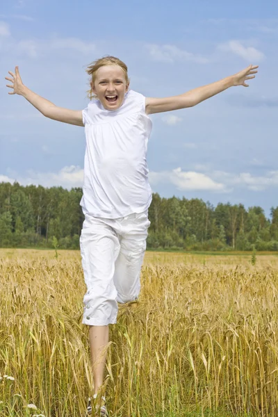 Teenager girl run happiness on meadow — Stock Photo, Image