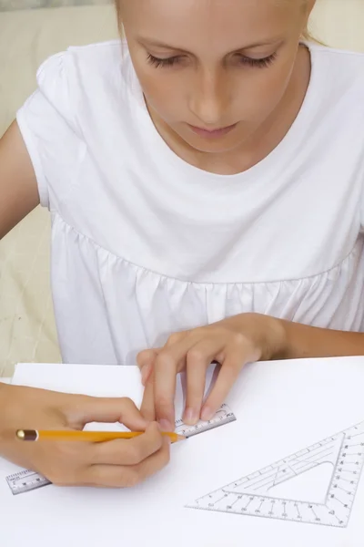 Teenager girl drawing lines — Stock Photo, Image