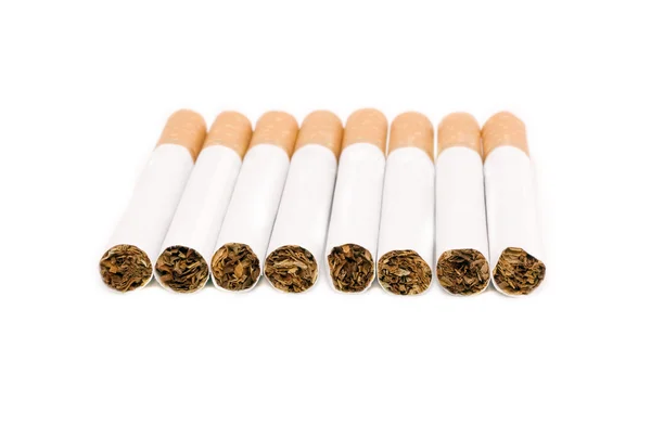 Zigaretten über Weiß — Stockfoto