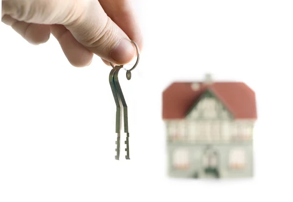 House and keys over white — Stock Photo, Image
