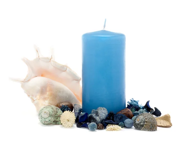 Blue candle with decoration over white — Stock Photo, Image