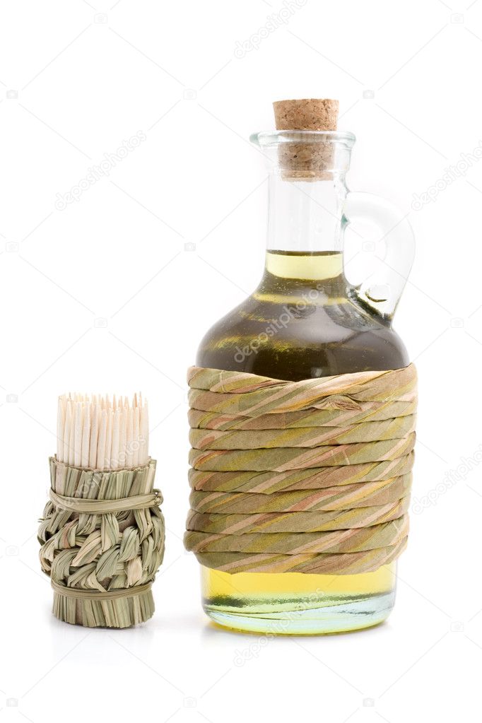 Toothpicks with olive oil over white