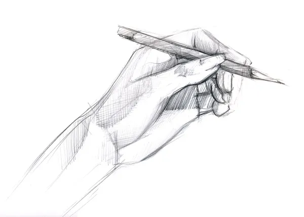 Un lápiz está en una mano —  Fotos de Stock