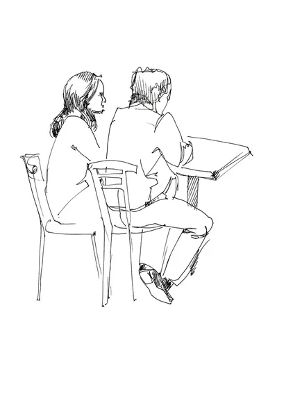 Парень и девушка за столом — стоковое фото