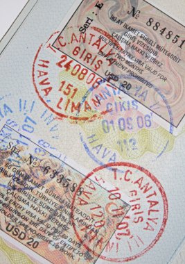 Passport with turkish visas and stamps clipart