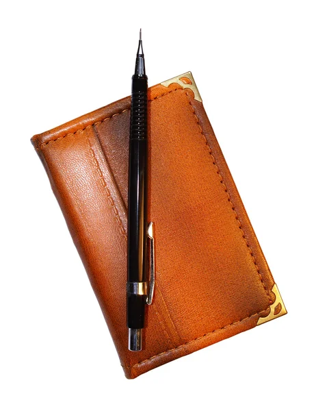 Bleistift auf Taschenbuch — Stockfoto