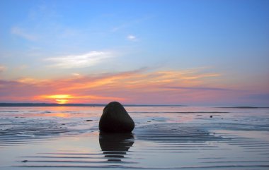 Lines and stone on the sand clipart