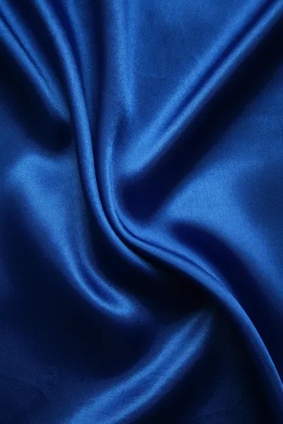 Glatte elegante dunkelblaue Seide als Backgro — Stockfoto