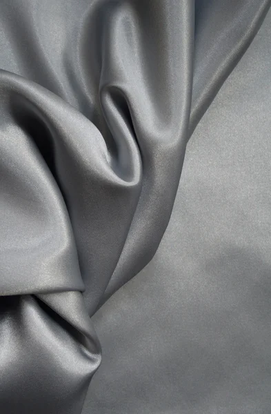 Hladké elegantní šedé hedvábí jako pozadí — Stock fotografie