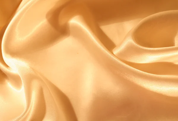 Smooth elegant golden silk as background — Stock Photo, Image