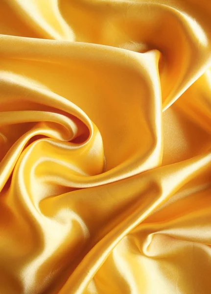 Liso elegante cetim dourado como backgroun — Fotografia de Stock