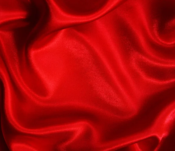 Гладкий червоний шовк як фон — стокове фото