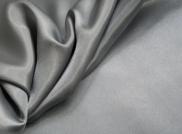 Glatt, elegant, grå silke som bakgrunn – stockfoto