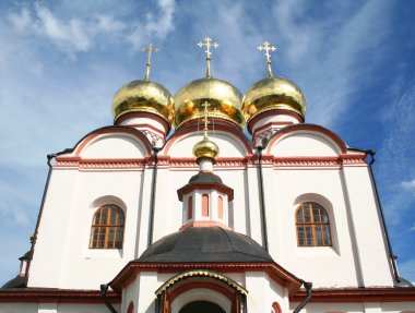 Golden domes of Valdaisky Iversky Svyato clipart