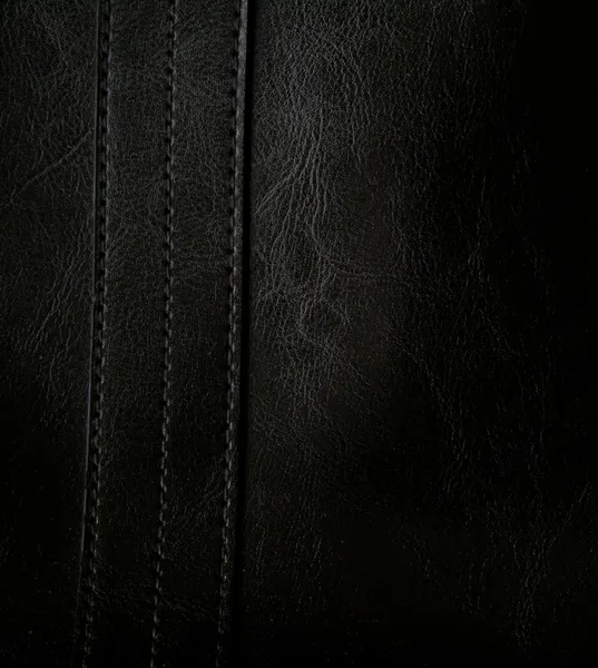 Крупный план черной кожаной текстуры — стоковое фото