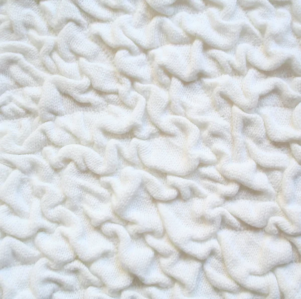 White knitted fabric as background — Stock Photo, Image
