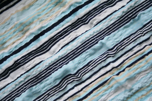 Блакитні, чорні та блакитні смуги на тканині — стокове фото